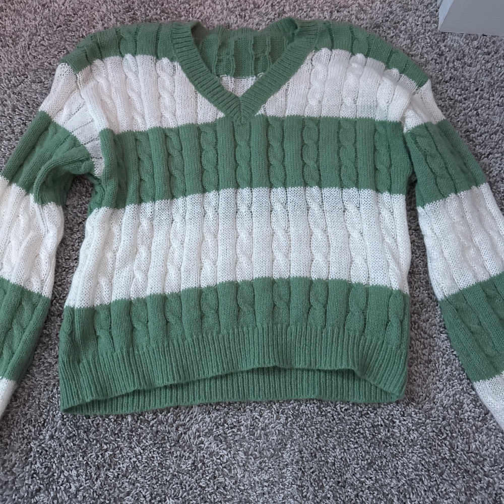 Green and white sweater